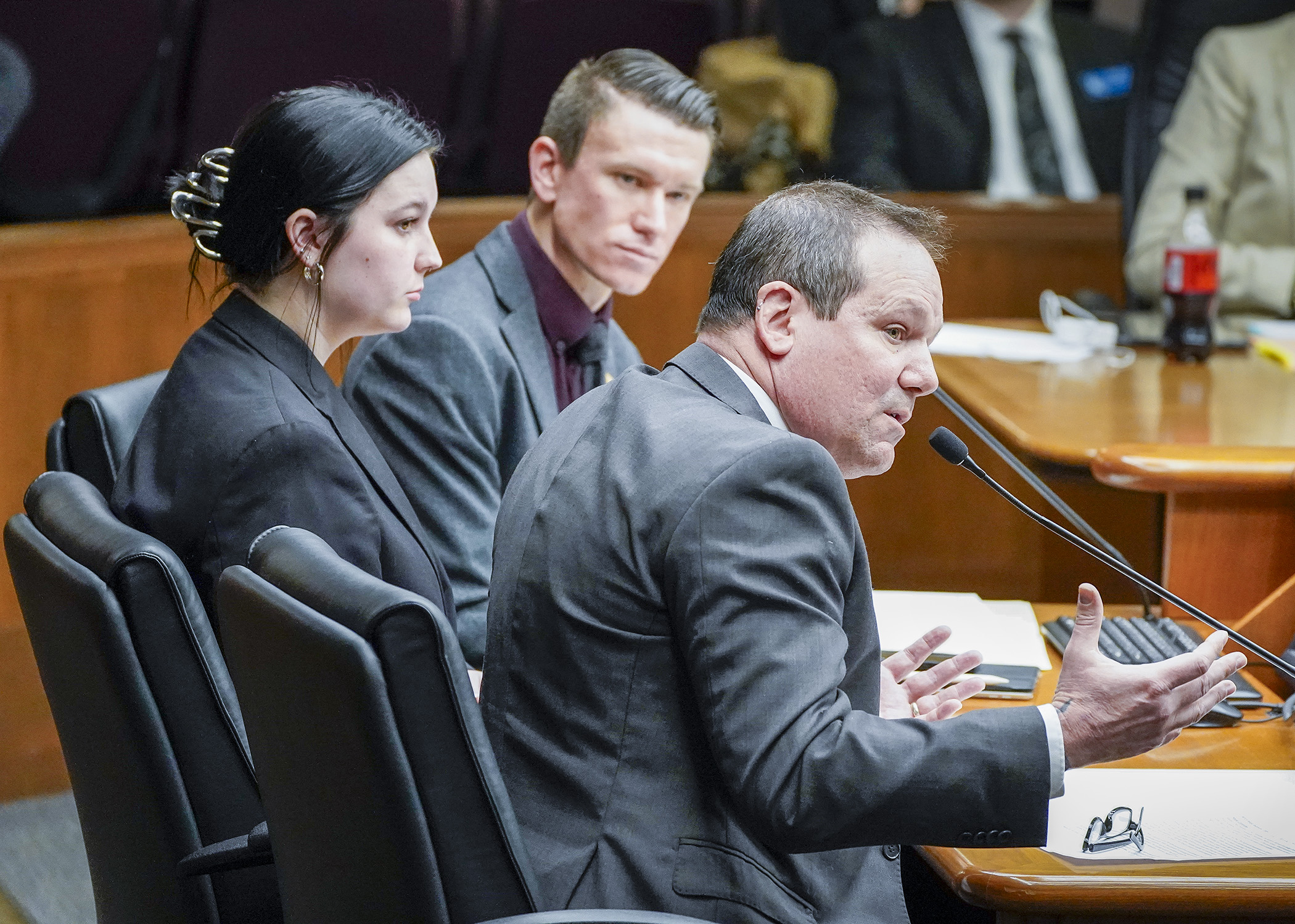 P.E.A.S.E. Academy Director Michael Durchslag testifies with Class of 2024 student Lucy Getschow before the House Education Finance Committee Feb. 22 in support of a bill to increase approved recovery program grant amounts. (Photo by Andrew VonBank)